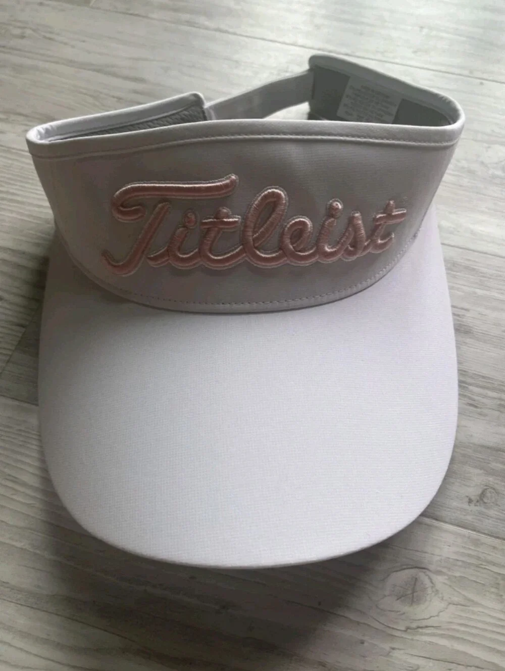 Titleist Women’s Sundrop Adjustable Golf Visor in White and Pink